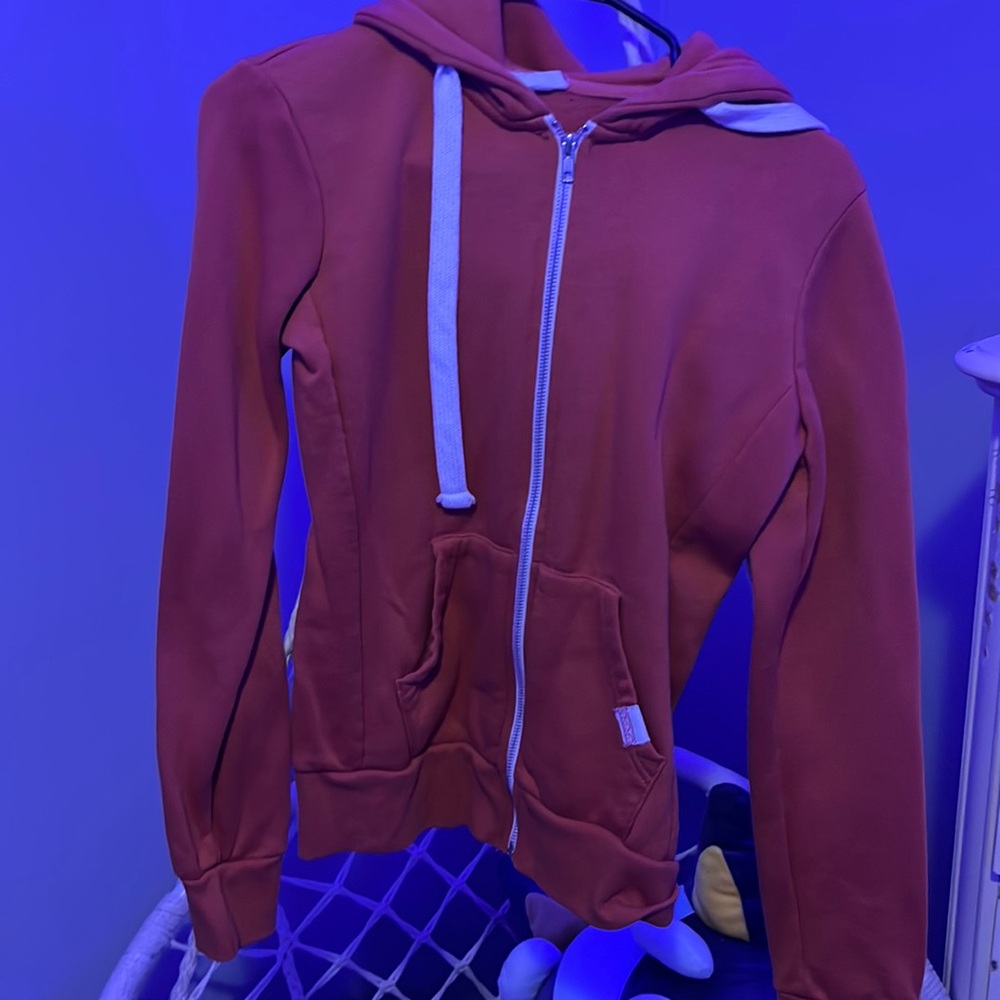 orange zip up